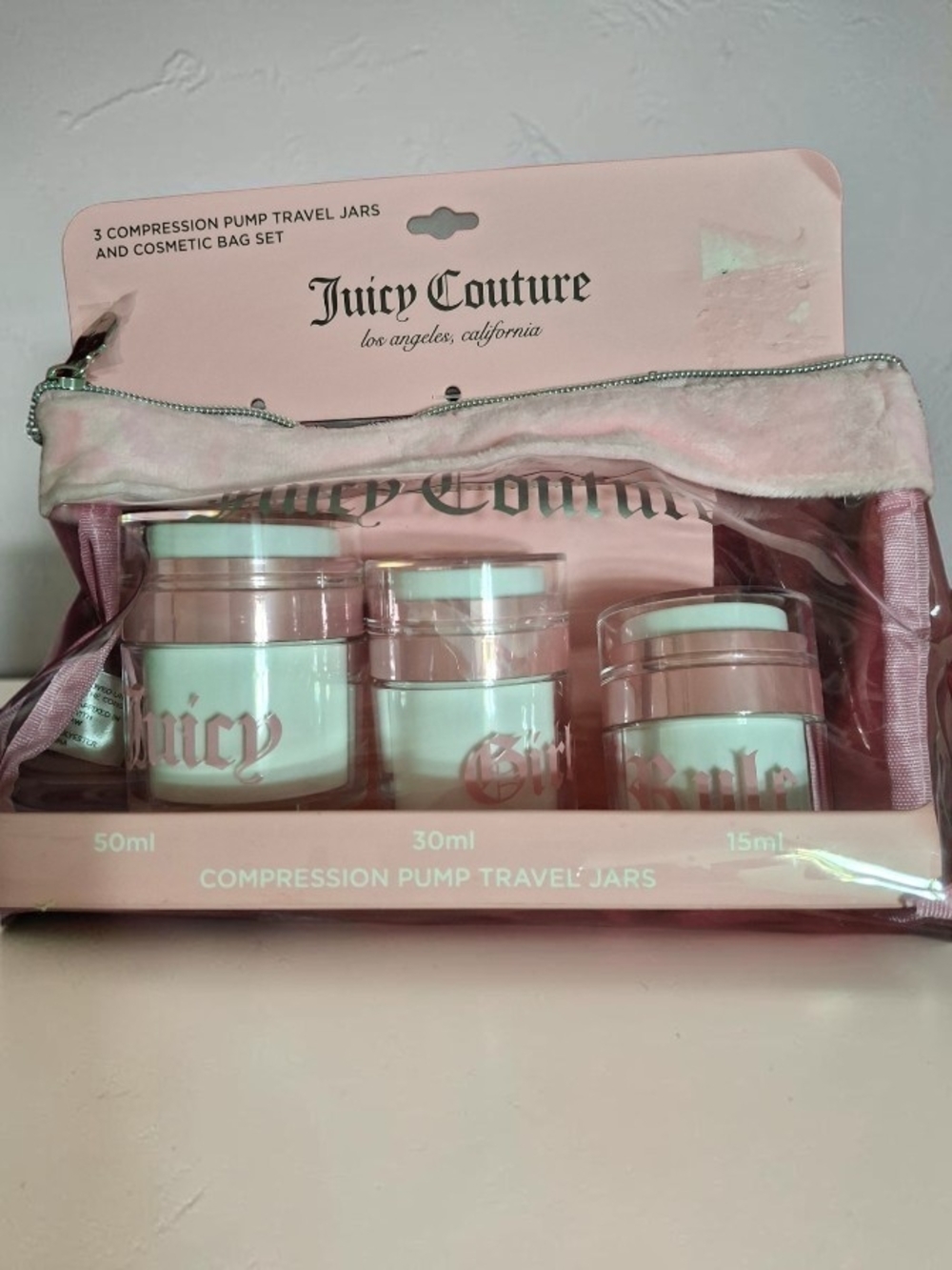 Juicy Couture Pink Travel Compression Pump Jar Set with Cosmetic Bag